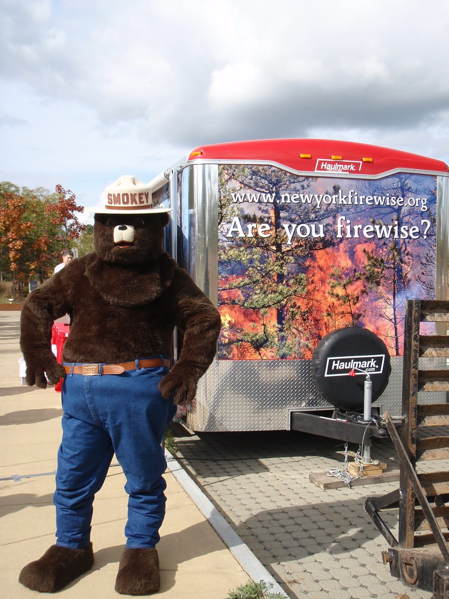 Smokey_Bear_at_the_Pine_Bush_with the Firewise Education trailer in 2012
